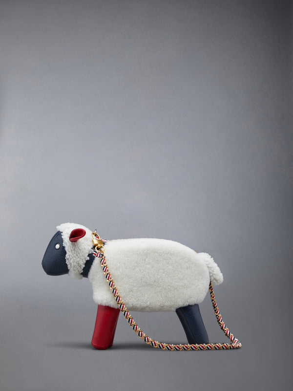 SMALL SHEEP CHAIN BAG IN SHEARLING & PEBBLE GRAIN - featured image