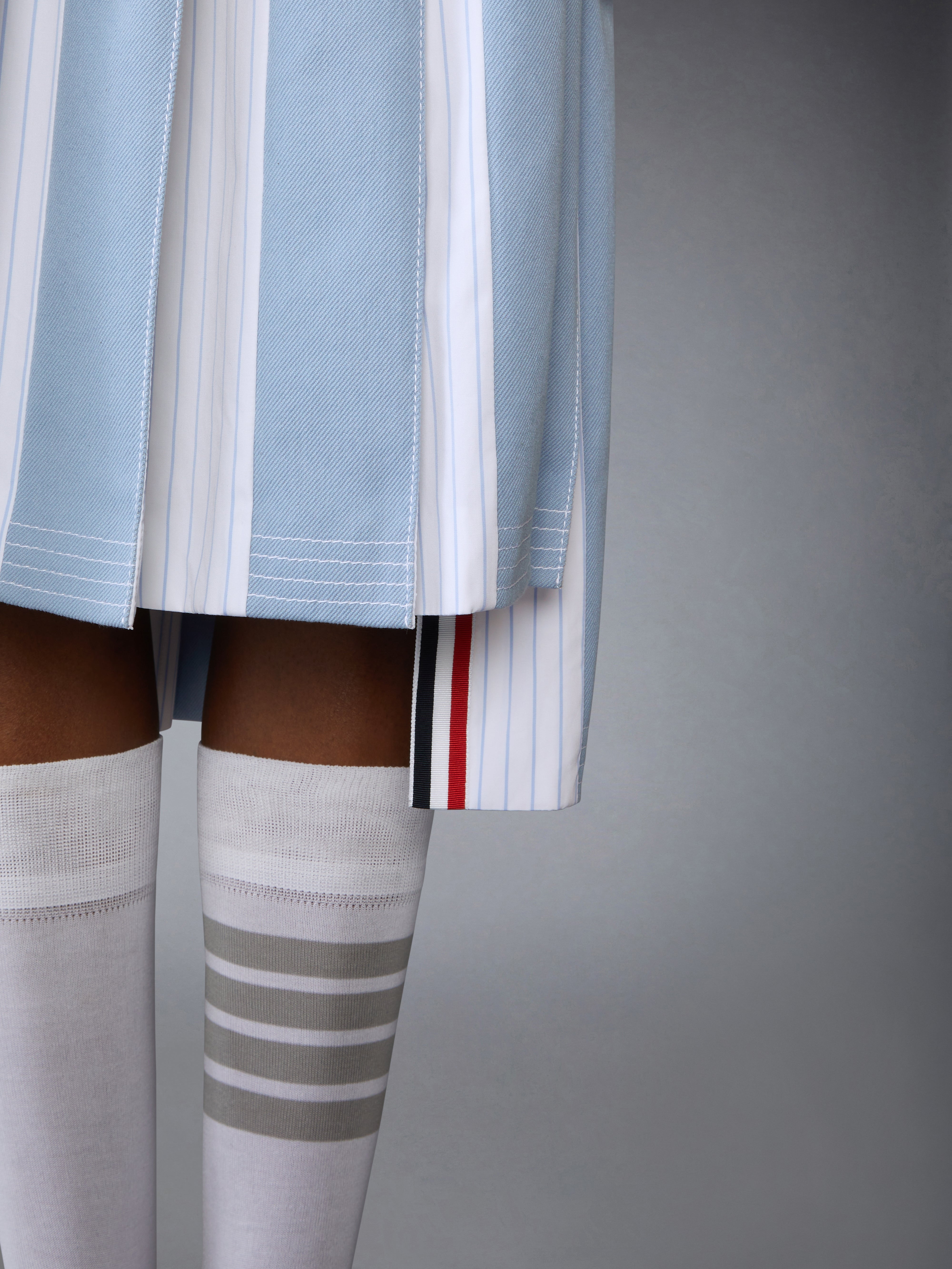Thom Browne｜SKIRTS (DROPPED BACK PLEATED SKIRT IN ENGIN Thom Browne Dropped Back Mini Pleated Skirt | Blue | FARFETCH