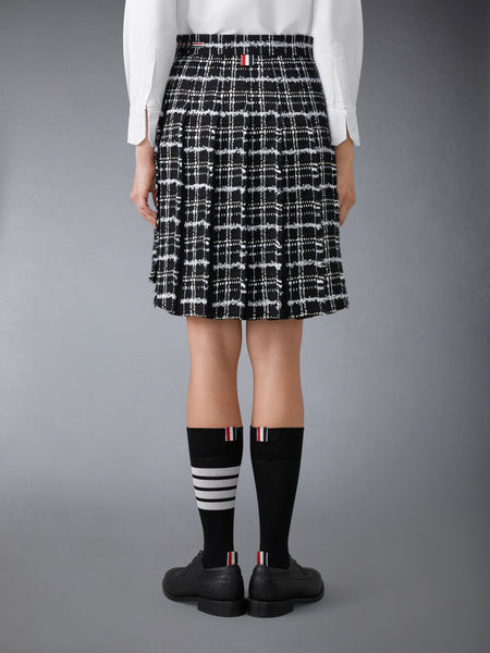 RIBBON TWEED PLEATED SKIRT WITH FRAY EDGE BLACK