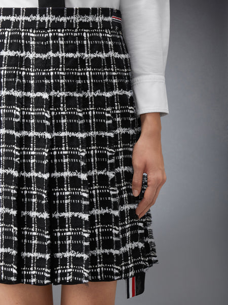 RIBBON TWEED PLEATED SKIRT WITH FRAY EDGE BLACK