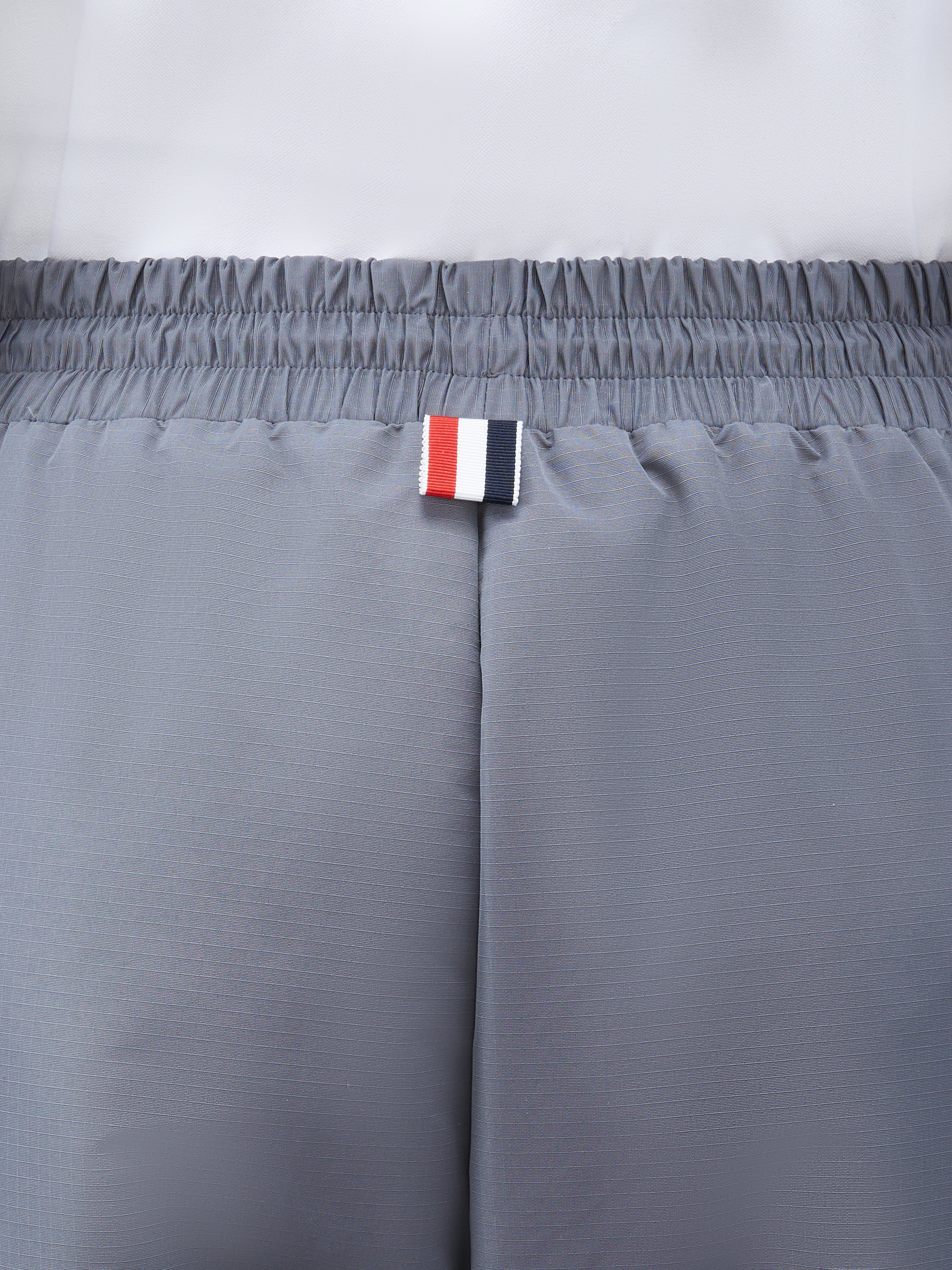 THOM BROWNE NEW YORK テーパード コットン スラックスパンツ Men's Trousers - Casual & Suit Pants | Thom Browne